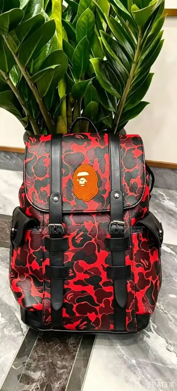 A Bathing Ape (Bape) Camo Bagspack Featuring a Centered Ape Head