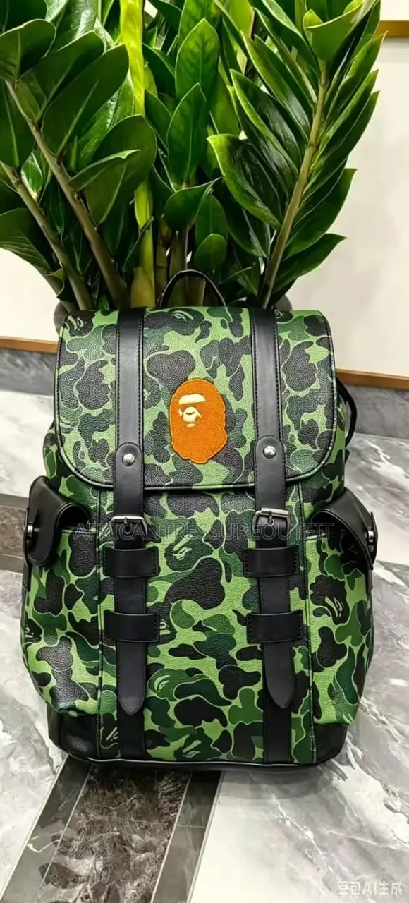 A Bathing Ape (Bape) Camo Bagspack Featuring a Centered Ape Head