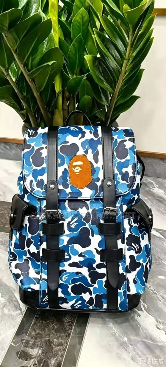 A Bathing Ape (Bape) Camo Bagspack Featuring a Centered Ape Head