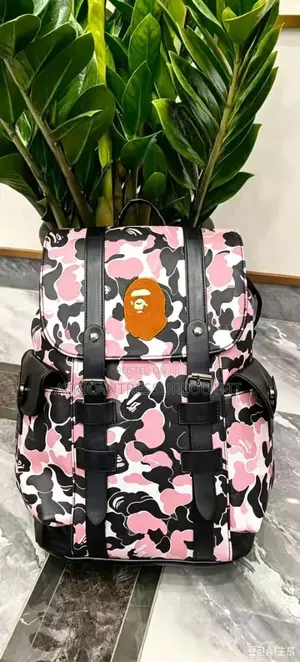 A Bathing Ape (Bape) Camo Bagspack Featuring a Centered Ape Head