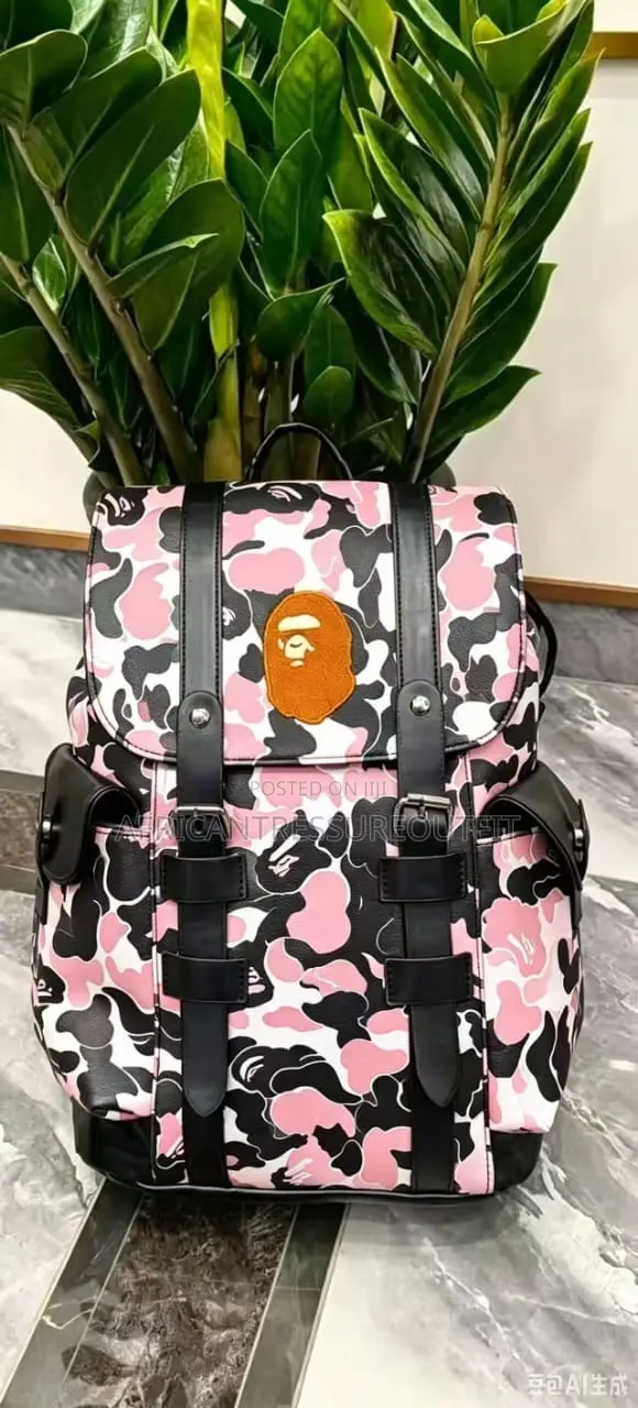 A Bathing Ape (Bape) Camo Bagspack Featuring a Centered Ape Head