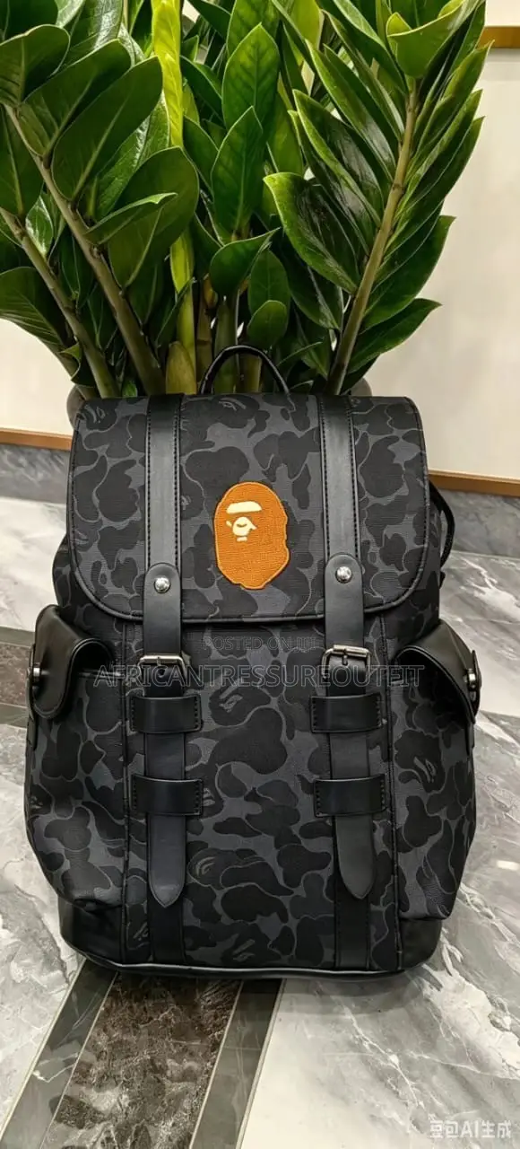 A Bathing Ape (Bape) Camo Bagspack Featuring a Centered Ape Head