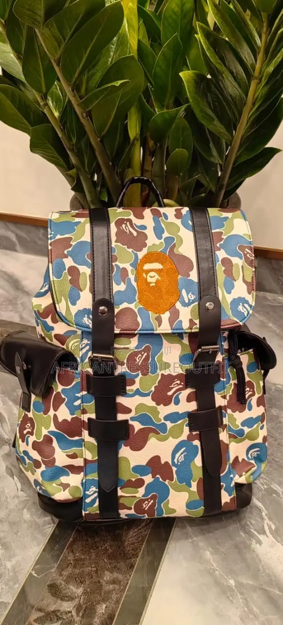 A Bathing Ape (Bape) Camo Bagspack Featuring a Centered Ape Head