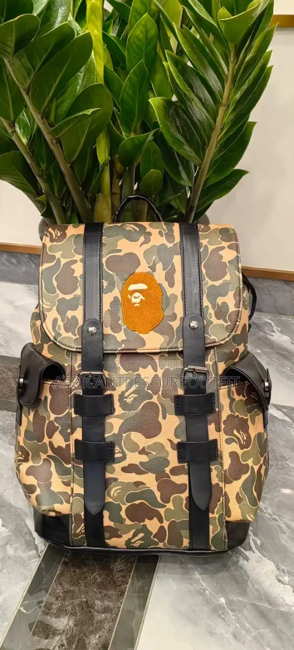 A Bathing Ape (Bape) Camo Bagspack Featuring a Centered Ape Head
