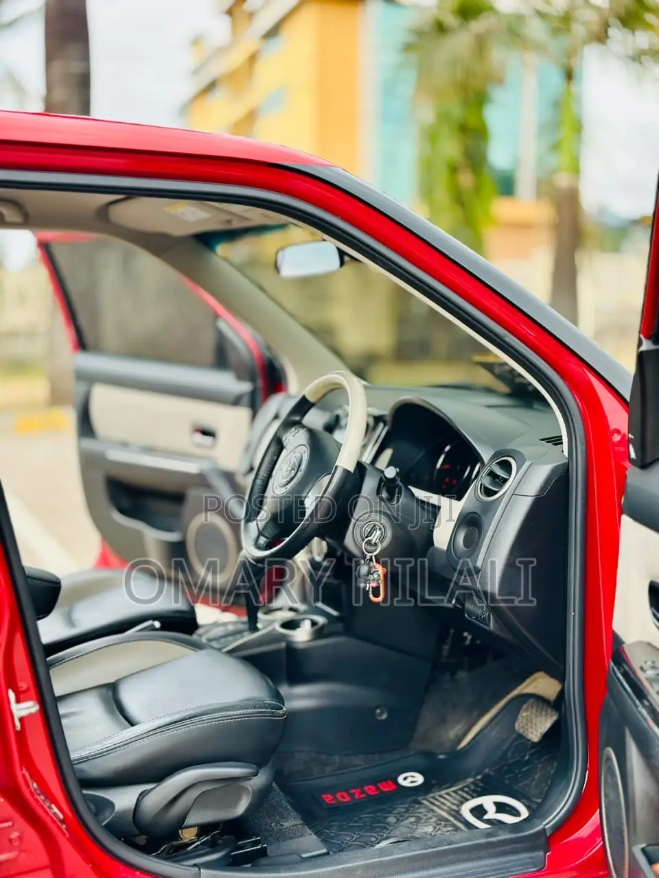 Mazda Verisa 2010 Red