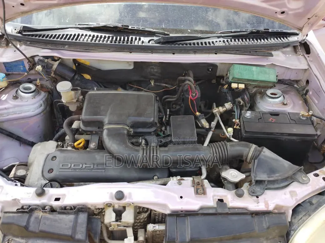 Suzuki Swift 2003 Pink