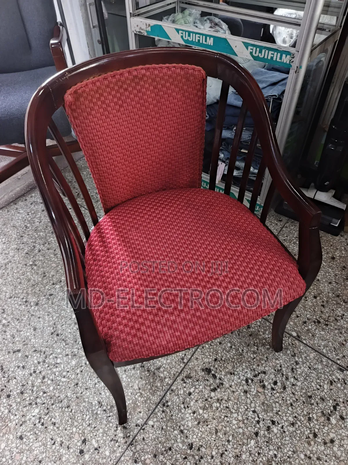 Classic Wooden Armchair With a Polished Wood & Red Textured Upholstery