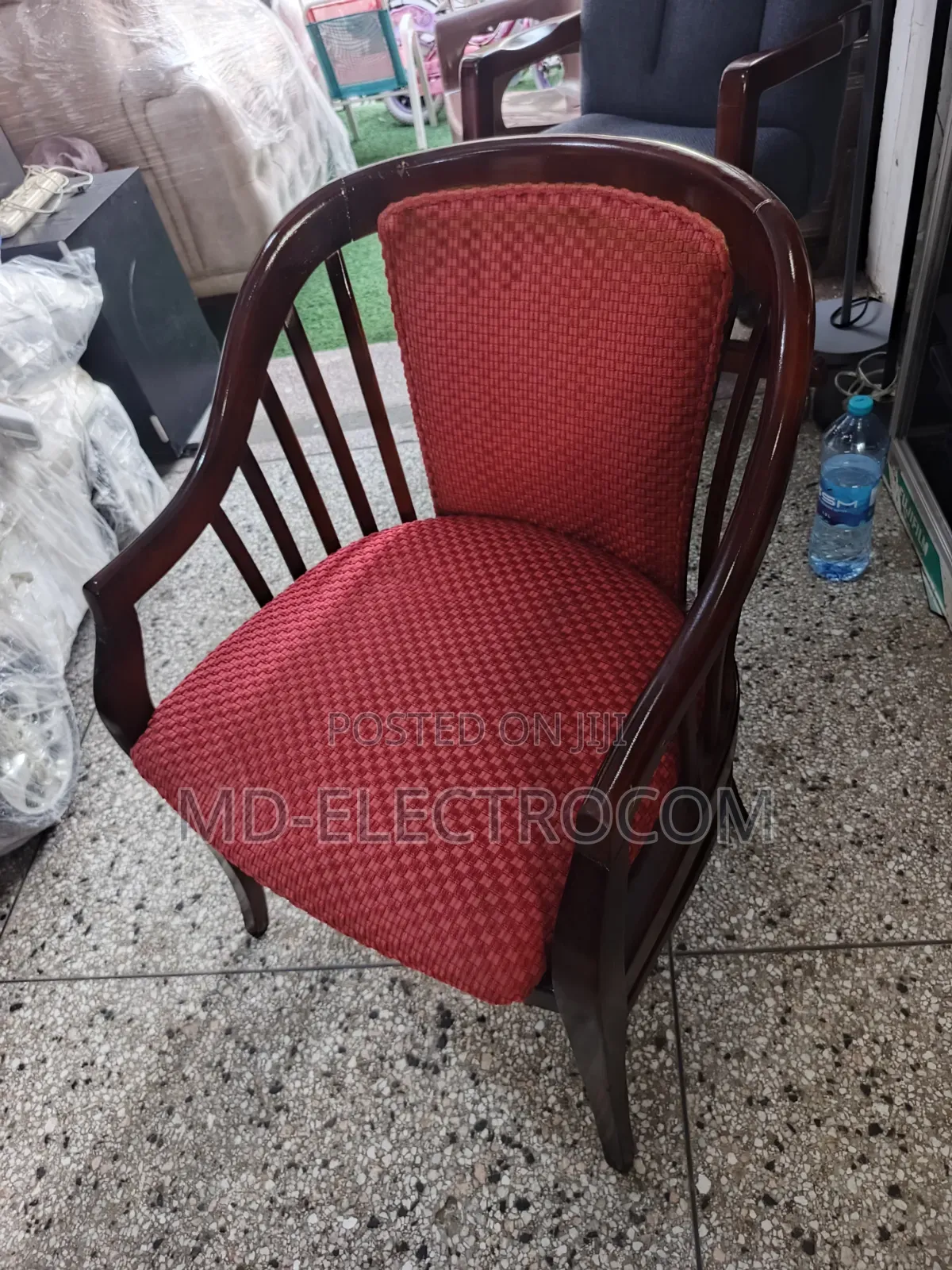 Classic Wooden Armchair With a Polished Wood & Red Textured Upholstery
