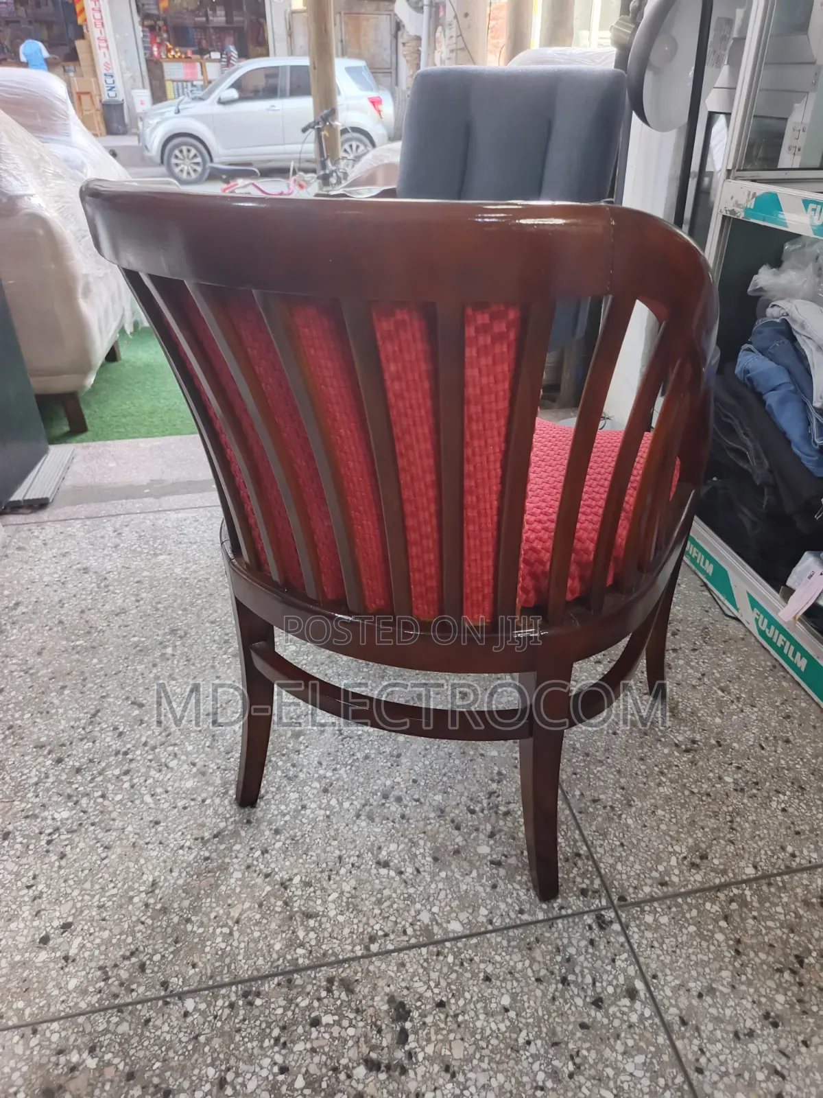 Classic Wooden Armchair With a Polished Wood & Red Textured Upholstery