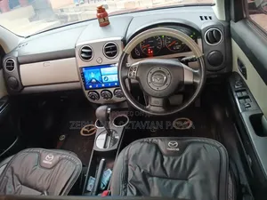 Mazda Verisa 2011 Maroon