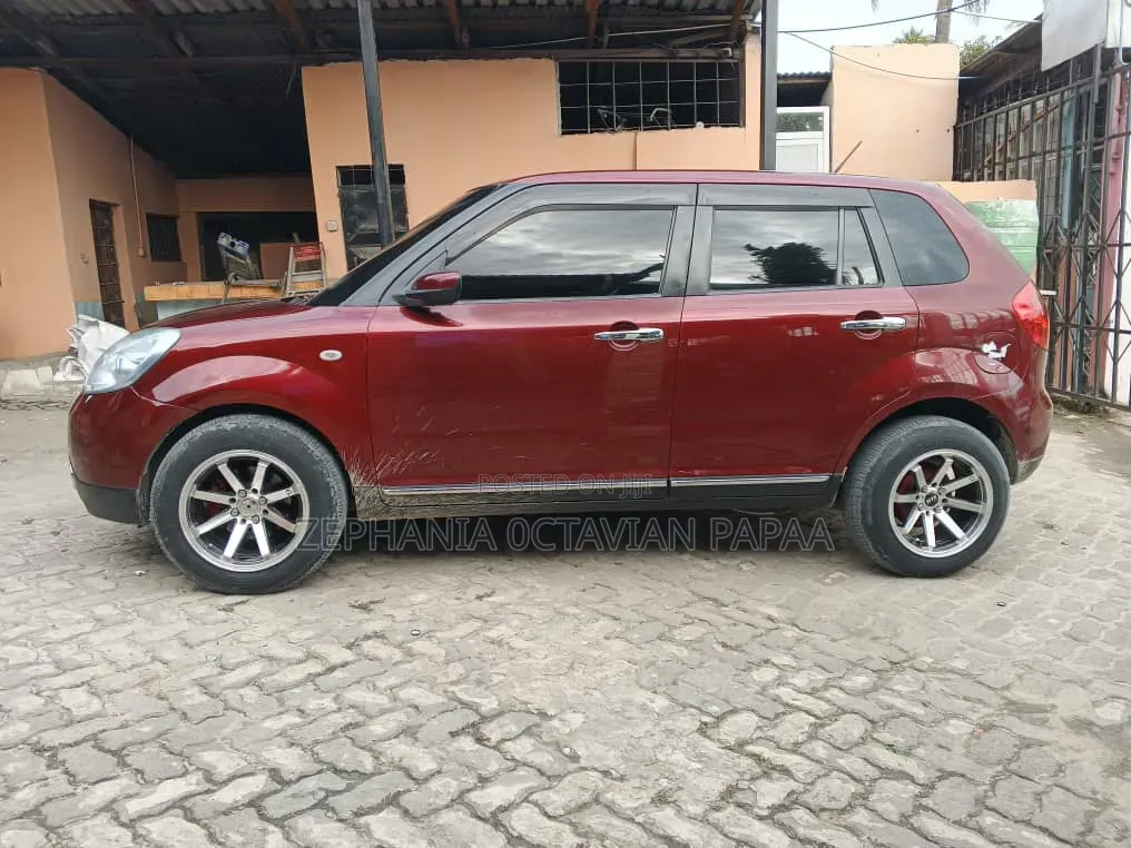 Mazda Verisa 2011 Maroon