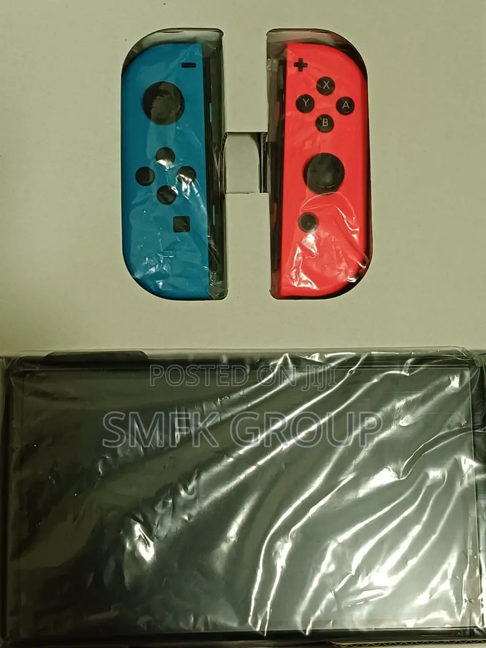 Nintendo Switch OLED Bundle With 5 Games & Extra Joy-Cons, Case, Etc.