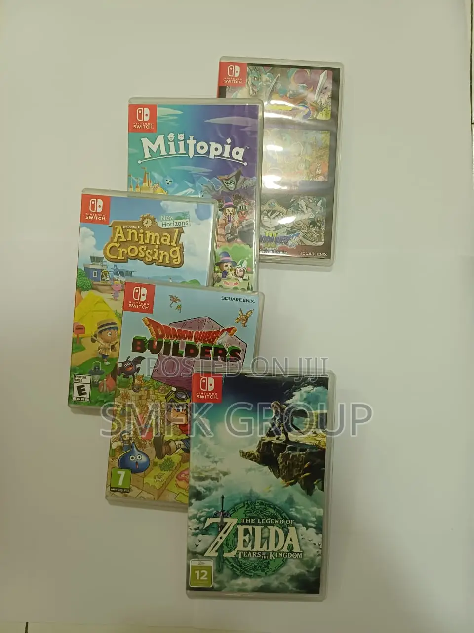 Nintendo Switch OLED Bundle With 5 Games & Extra Joy-Cons, Case, Etc.