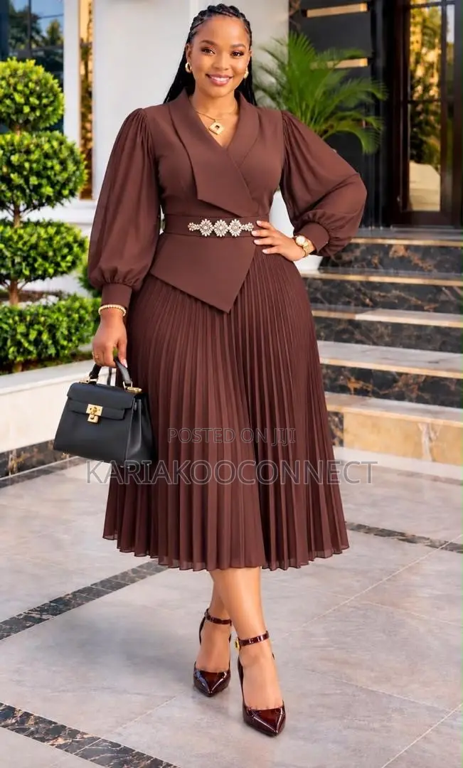 Elegant Pleated Skirt Set With Puff-Sleeve Top