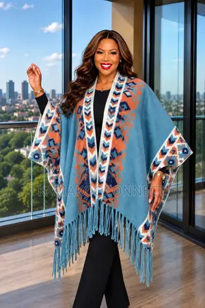 Fringed Poncho With Patterned Trim