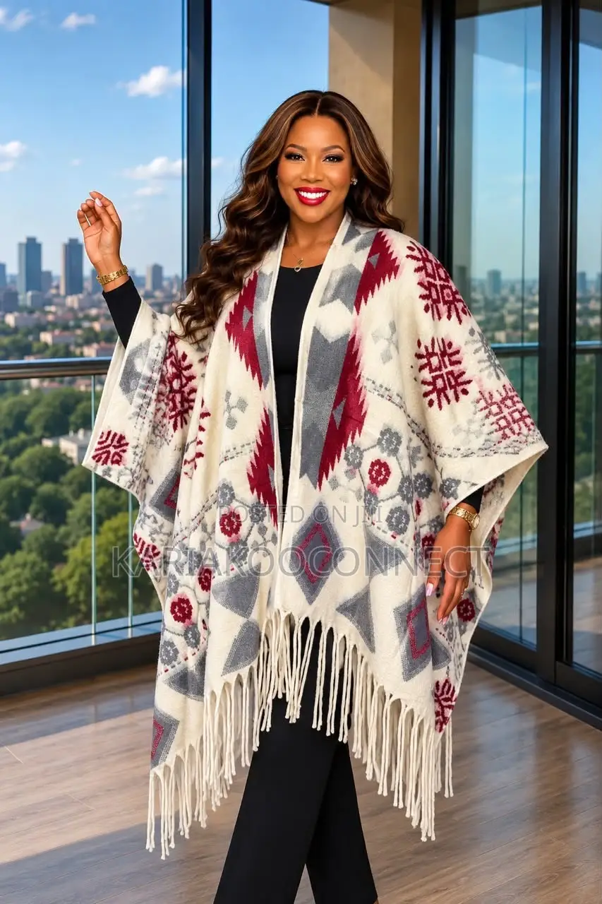 Fringed Poncho With Patterned Trim