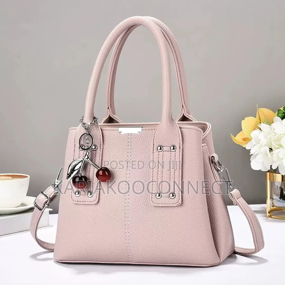 Elegant Handbag With Cherry Charm and Shoulder Strap