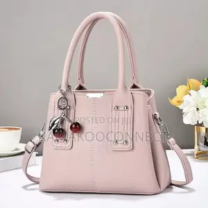 Elegant Handbag With Cherry Charm and Shoulder Strap