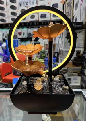 A 3-Tier Lotus Tabletop Water Fountain With a Warm LED Backlit Ring