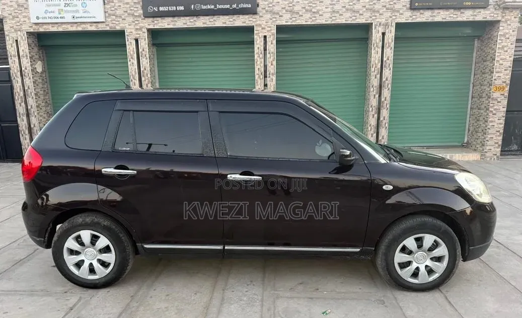 Mazda Verisa 2010 Maroon