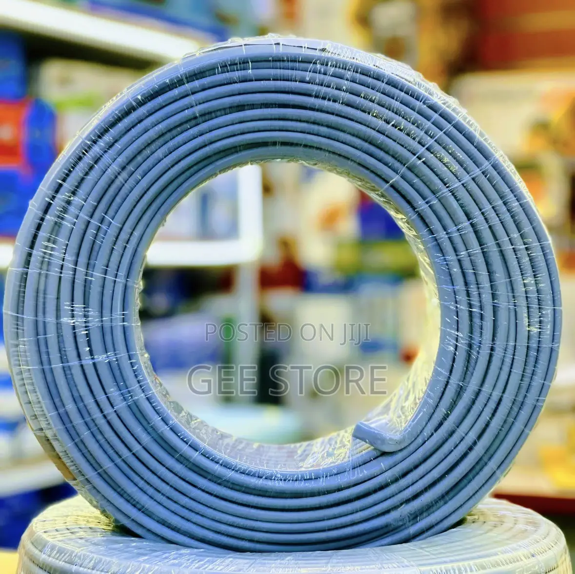 A 100-Meter Roll of Grey Flat Twin Electrical Wiring Cable With Earth