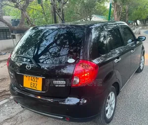 Mazda Verisa 2011 Red