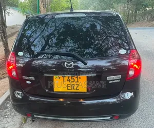 Mazda Verisa 2011 Red