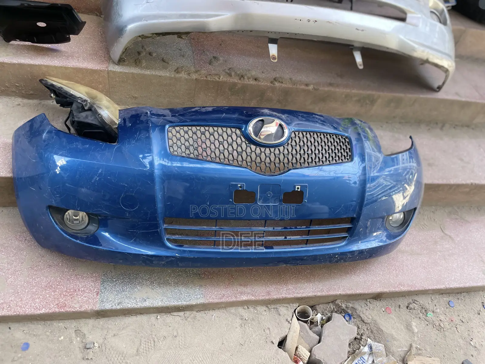 Blue Front Bumper Assembly for a Second-Generation Toyota Vitz /