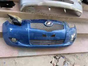 Blue Front Bumper Assembly for a Second-Generation Toyota Vitz /