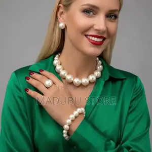 Set of Pearl Necklace, Earrings and Bracelet