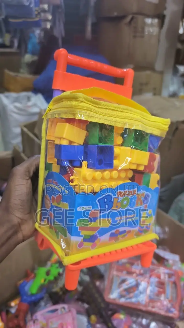 Set of Small Building Puzzle Blocks in a Trolley