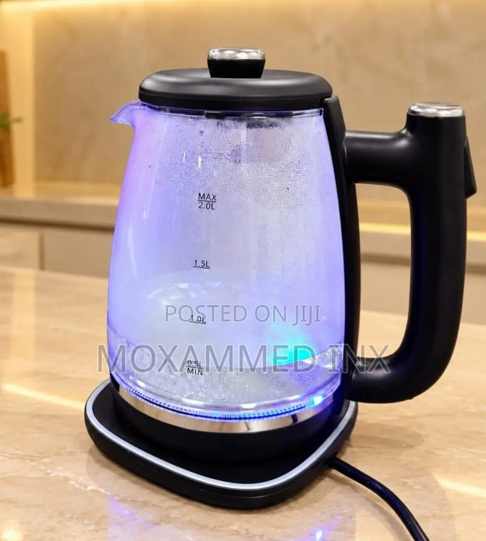 Glass Electric Kettlewith a Black Plastic Handle, a Black Lid,