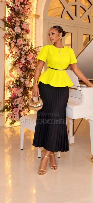 Elegant Peplum Top & Pleated Skirt Set