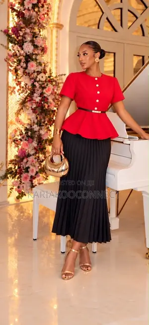 Elegant Peplum Top & Pleated Skirt Set