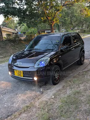 Mazda Verisa 2011 Brown