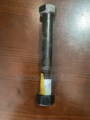 5/8” X 5” Partially Threaded Heavy Hex Bolt Paired With a Hex Nut
