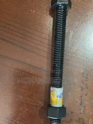 5/8” X 6” Fully Threaded Heavy Hex Bolt Paired With a Hex Nut.