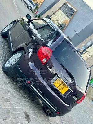 Mazda Verisa 2009 Maroon