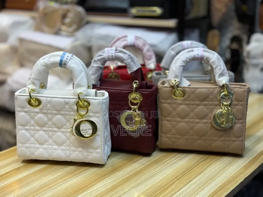The Quality Material Handbags  With Luxury Look  