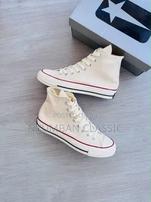 High Cat Converse All-Star Sneakers