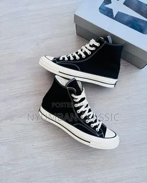 High Cat Converse All-Star Sneakers