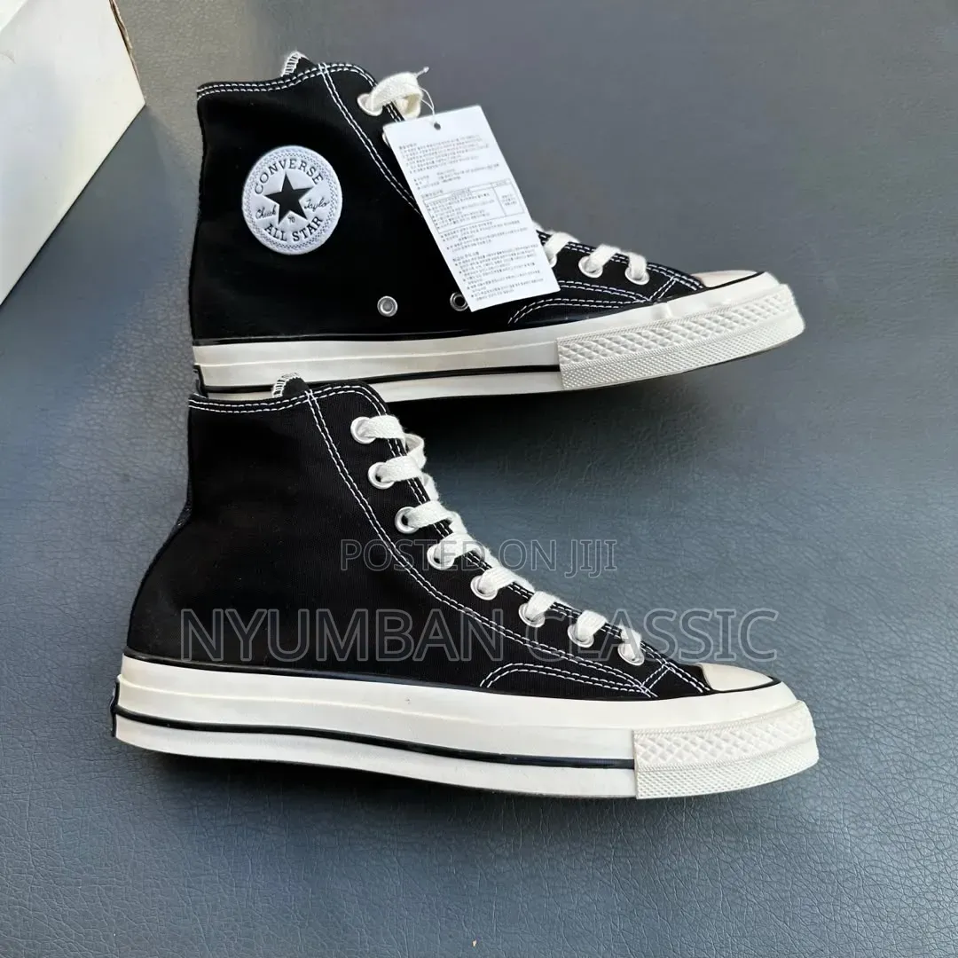 High Cat Converse All-Star Sneakers