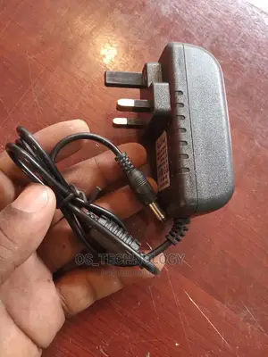 New Adapter DC 12V 2A.