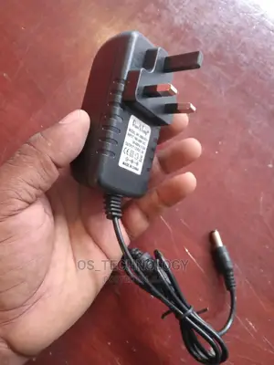 New Adapter DC 12V 2A.
