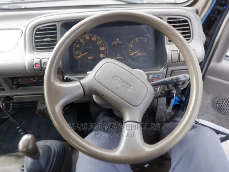 Isuzu Elf Excavator Truck