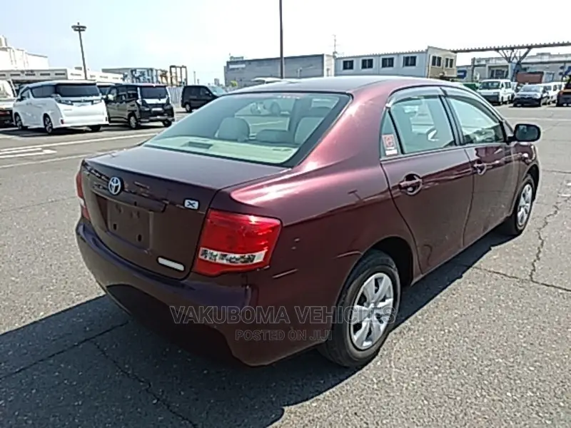 Toyota Axio 2009 Burgandy