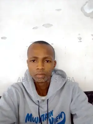 My Name Is Abubakar Simba Working as a Security Guard