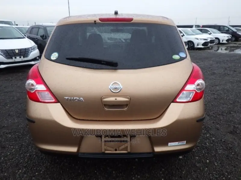 Nissan Tiida 2009 Orange