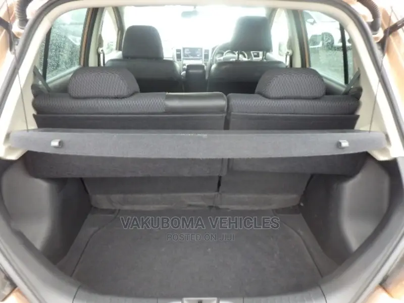 Nissan Tiida 2009 Orange