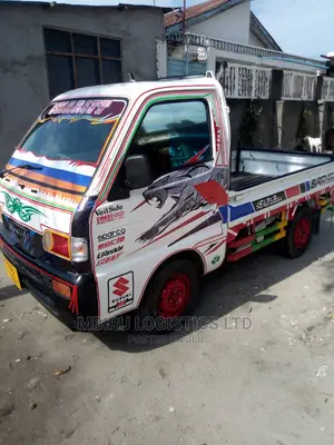 White Suzuki Cargo Carry 2002